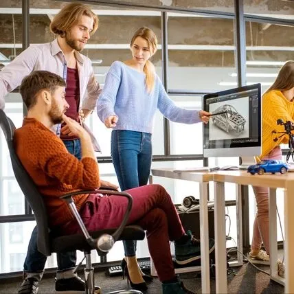 Children and a trainer during a technology workshop