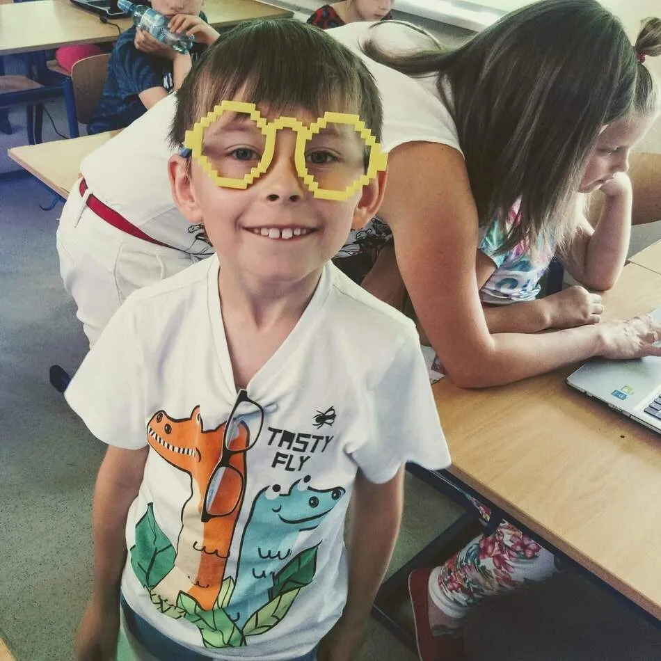 Boy wearing yellow 3D printed glasses